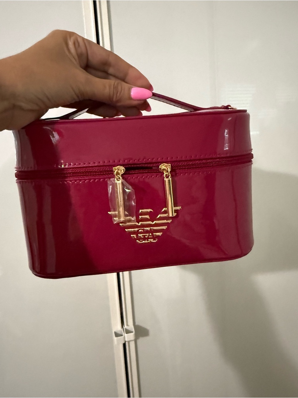 Patent-Finish Hot Pink Cosmetic Train Case with Gold Logo Accent